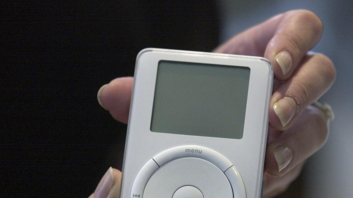 Apple's digital music player, iPod, is displayed after its introduction in 2001. — AP file