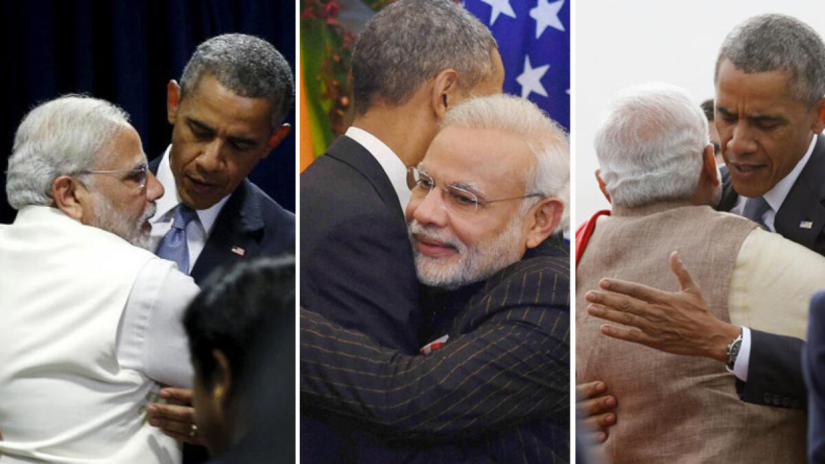 US president Barack Obama and Indian prime minister Narendra Modi embrace each other in this combo file picture.