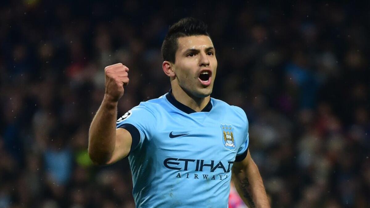 Manchester City's Argentinian striker Sergio Aguero celebrates scoring the opening goal from a penalty kick during the UEFA Champions League Group E football match between Manchester City and Bayern Munich at the Etihad Stadium in Manchester, northwest En