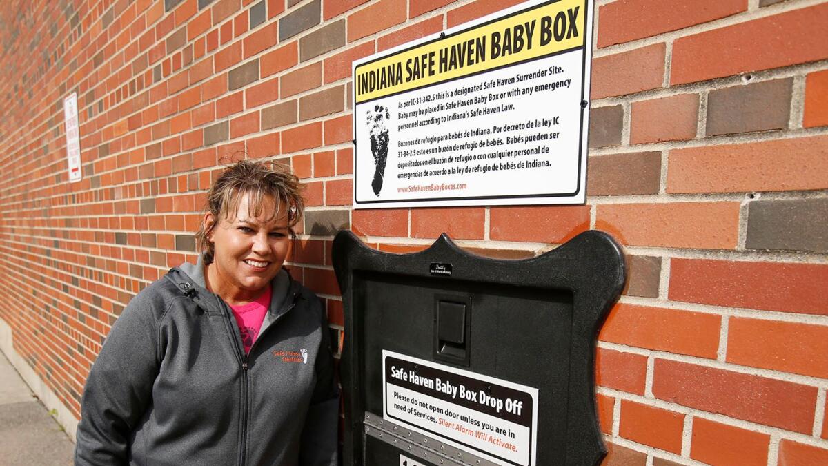 Monica Kelsey and the town of Woodburn, Ind., dedicated the first Safe Haven Baby Box of its kind on April 26, 2016, at the Woodburn Volunteer Fire Department. — AP file