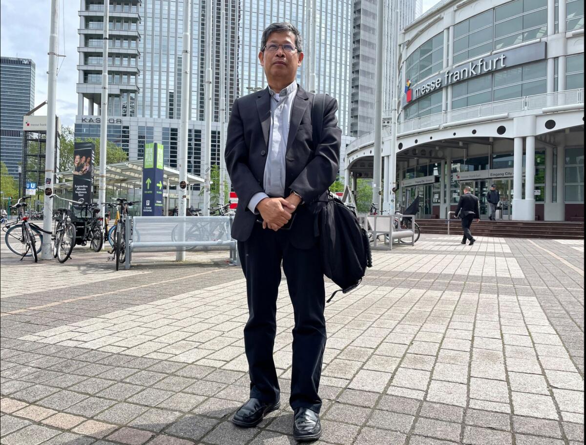 Edwin Gariguez, a Catholic priest from the Philippines, who is touring top European banks on environmental issues, in Frankfurt, Germany, on May 10, 2023. — Reuters