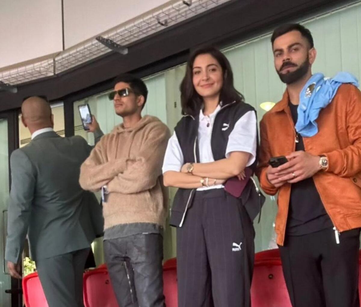 Virat Kohli, Anushka Sharma and Shubman Gill (left) during the FA Cup final. — Twitter