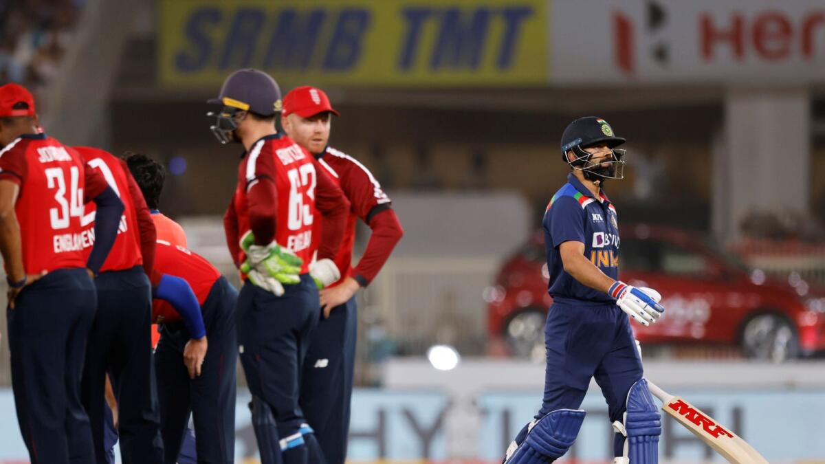 India's Virat Kohli walks off after his dismissal in first T20. — Reuters