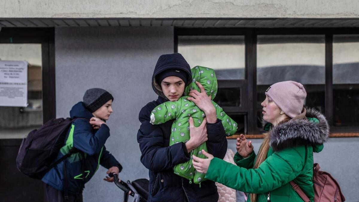 Refugees from Ukraine are seen after arriving at the Ukrainian-Polish border in Korczowa on March 02, 2022. Photo: AFP