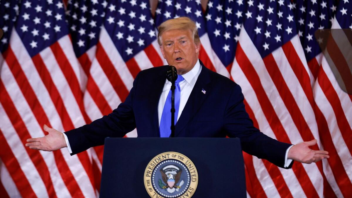 US President Donald Trump speaks about early results from the 2020 US presidential election in the East Room of the White House in Washington.