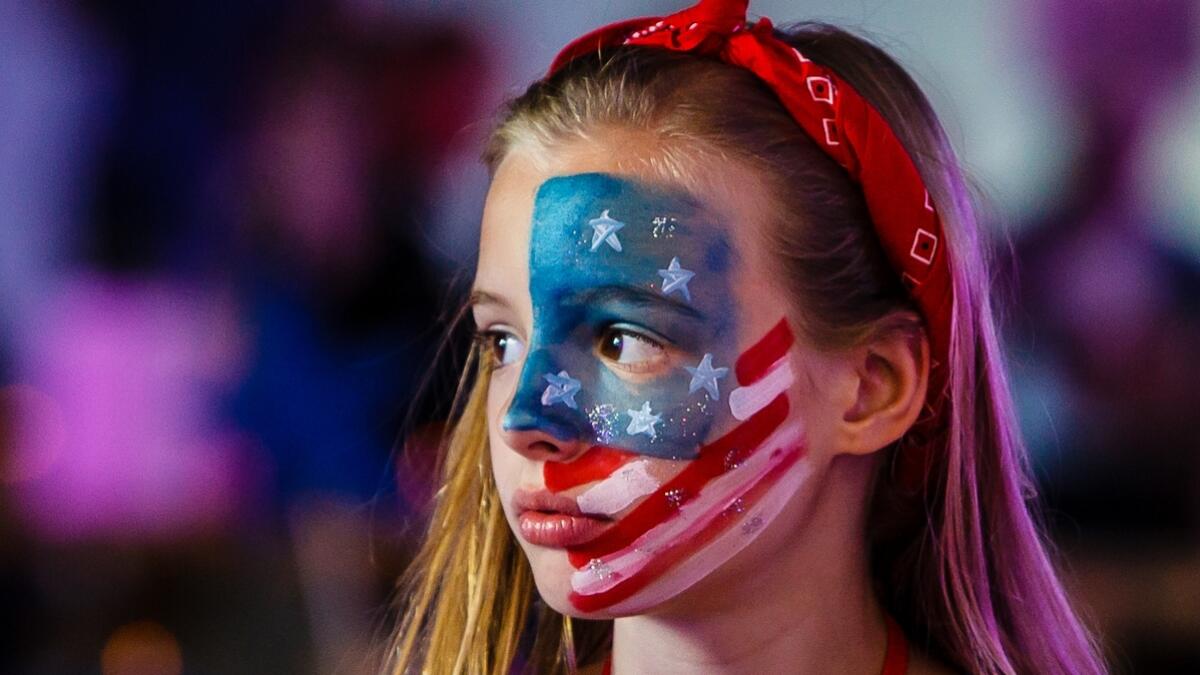US flag painted on an American girl's face during the gala US Independence Day dinner celebrations at Meydan in Dubai. (KT photo by Neeraj Murali)