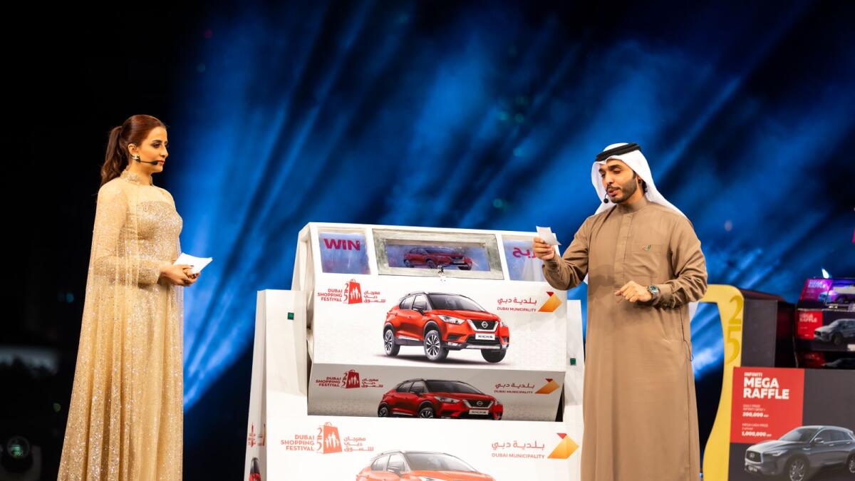 Abdulla Al Ameeri (R) announcing name of winners at a raffle draw. Photo: Supplied