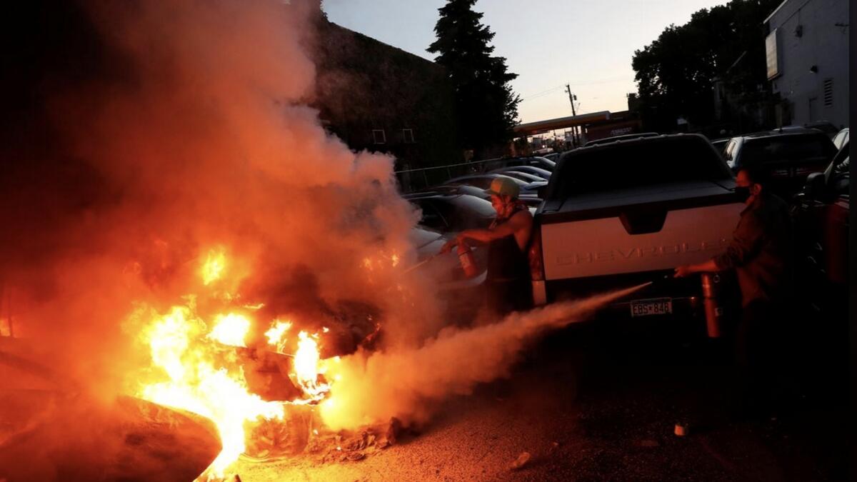 The charges brought by Hennepin County prosecutors came after a third night of arson, looting and vandalism in Minnesota’s largest city that saw protesters set fire to a police station and the National Guard deployed to help restore order.