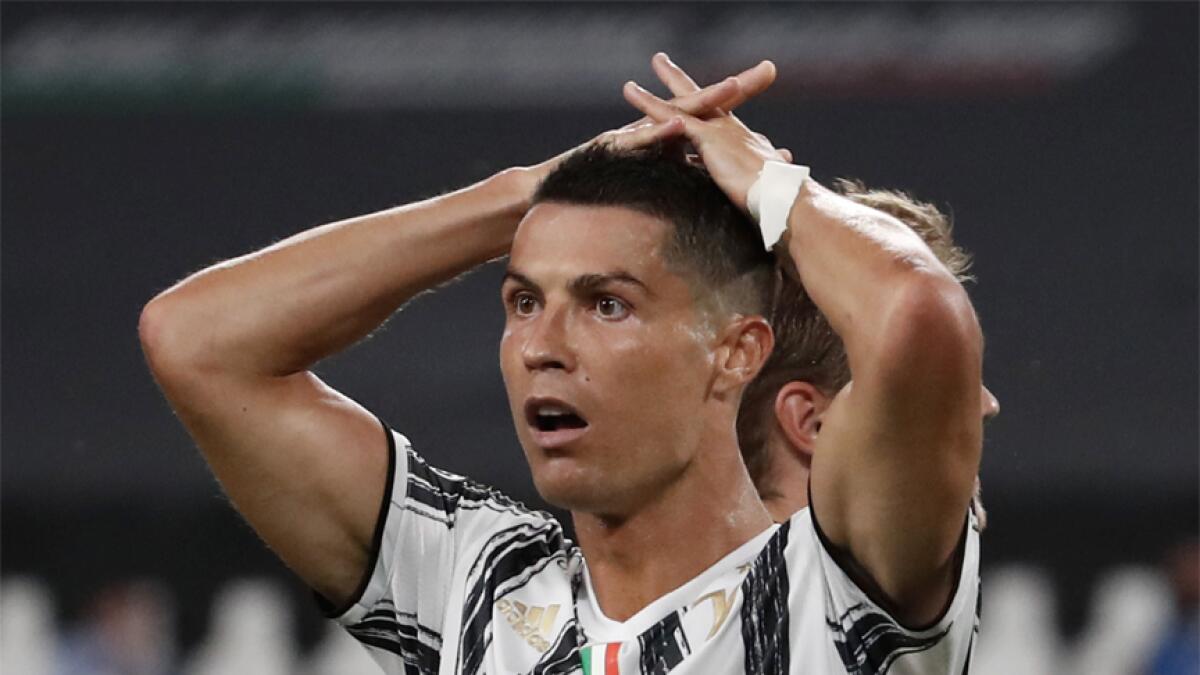 Juventus' Cristiano Ronaldo reacts during the Champions League round of 16 second leg match against Lyon. - AP