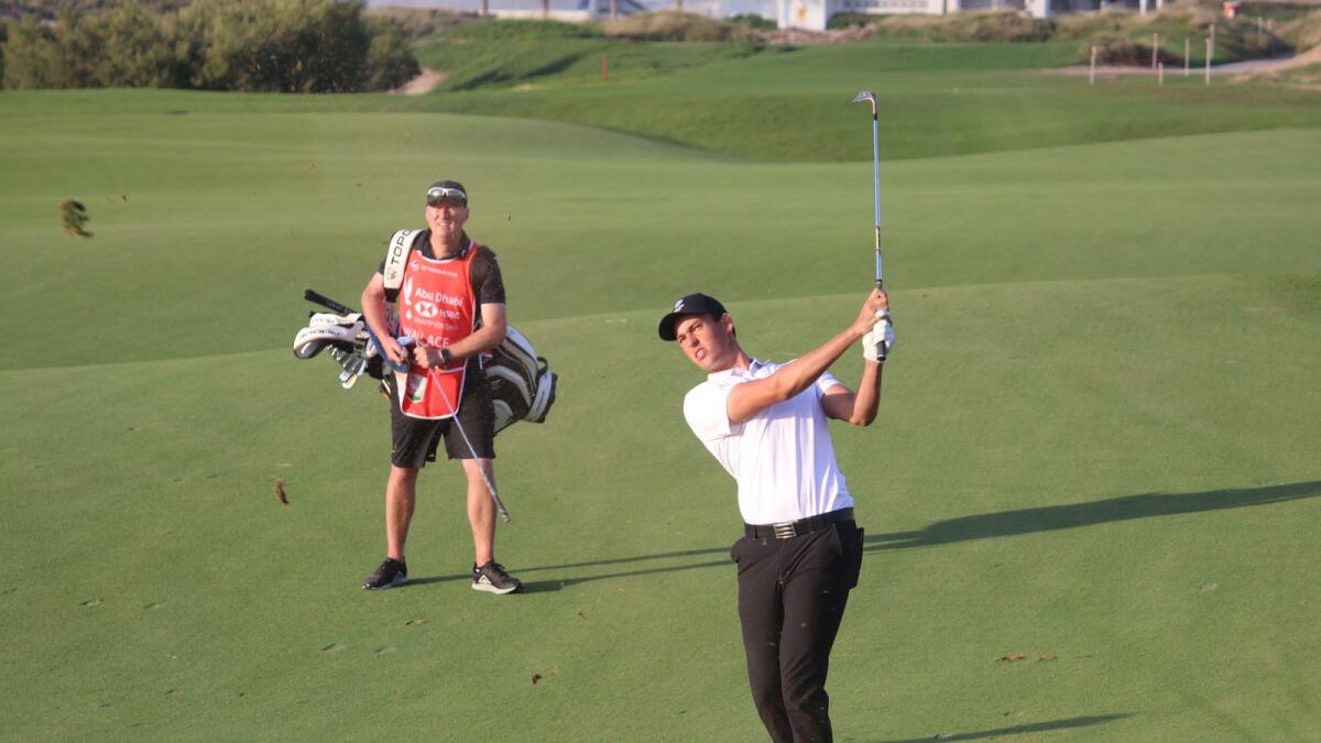 Josh Hill hits a shot during the third round of the Abu Dhabi HSBC Golf Championship on Saturday. (Joy Chakravarty)