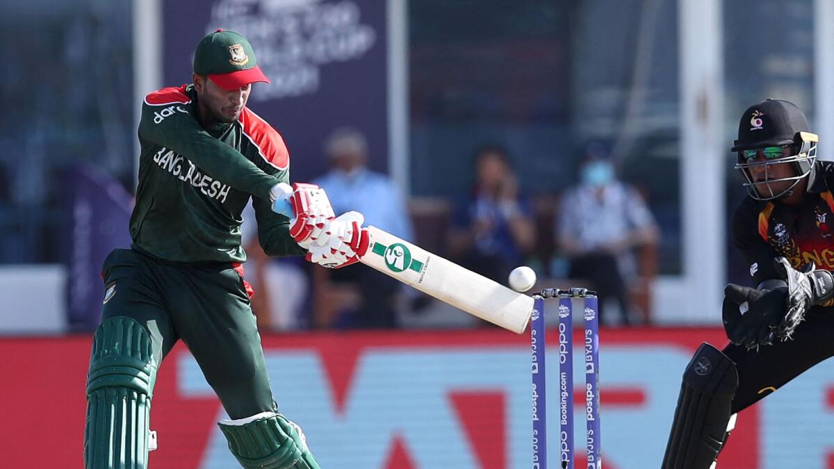 Bangladesh's Shakib Al Hasan plays a shot against Papua New Guinea in Muscat on Thursday. — AFP