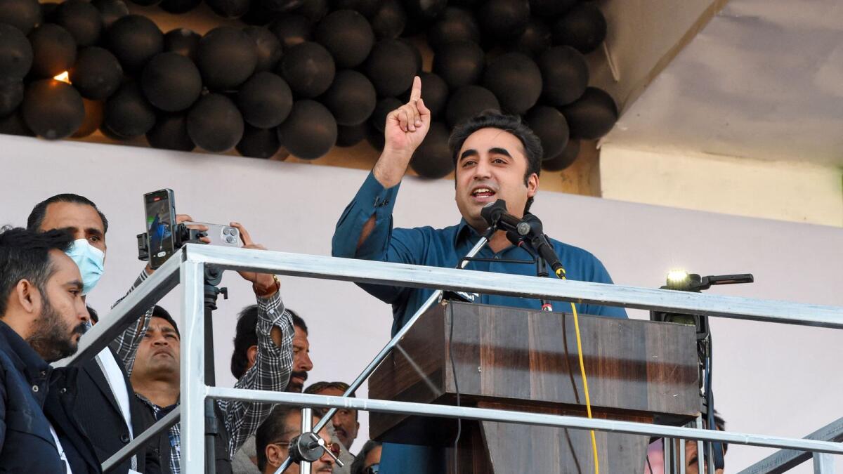 Pakistan Peoples' Party (PPP) chairman Bilawal Bhutto Zardari (2R) addresses a public meeting in Quetta on November 30, 2023. (Photo by Banaras KHAN / AFP)