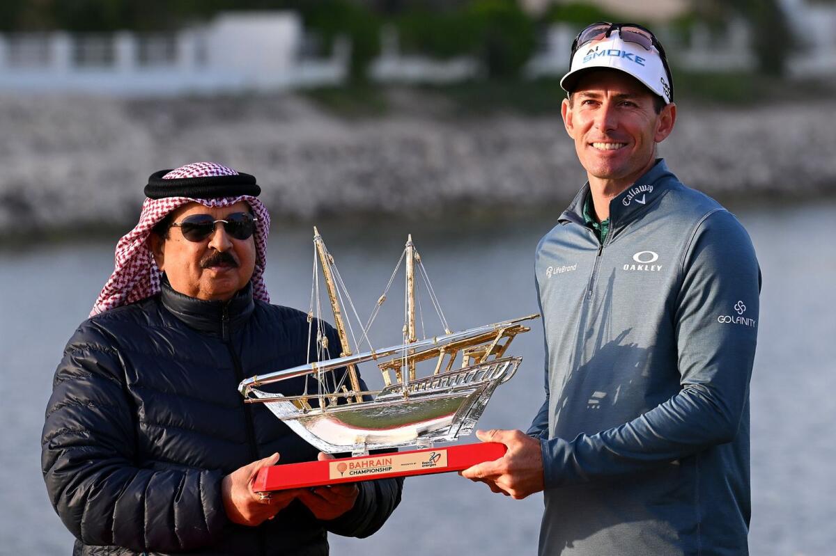 Dylan Frittelli is presented with the Bahrain Championship Trophy by His Majesty the King of the Kingdom of Bahrain, Hamad bin Isa Al Khalifa. - Supplied photo