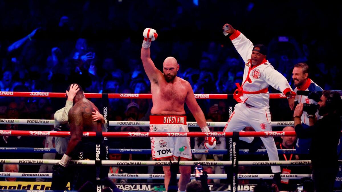 Tyson Fury celebrates after winning his fight against Dillian Whyte. (Reuters)