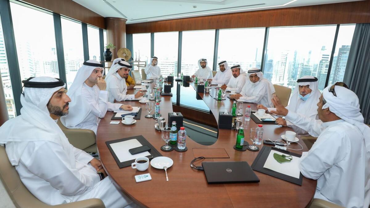 Hamad Buamim, president and CEO of Dubai Chambers, accompanied by the chamber’s directors and top officials, met Hamad Ahmed bin Fahad, Chairman of the Dubai Council of Wooden Ships and the founding members. — Supplied photo