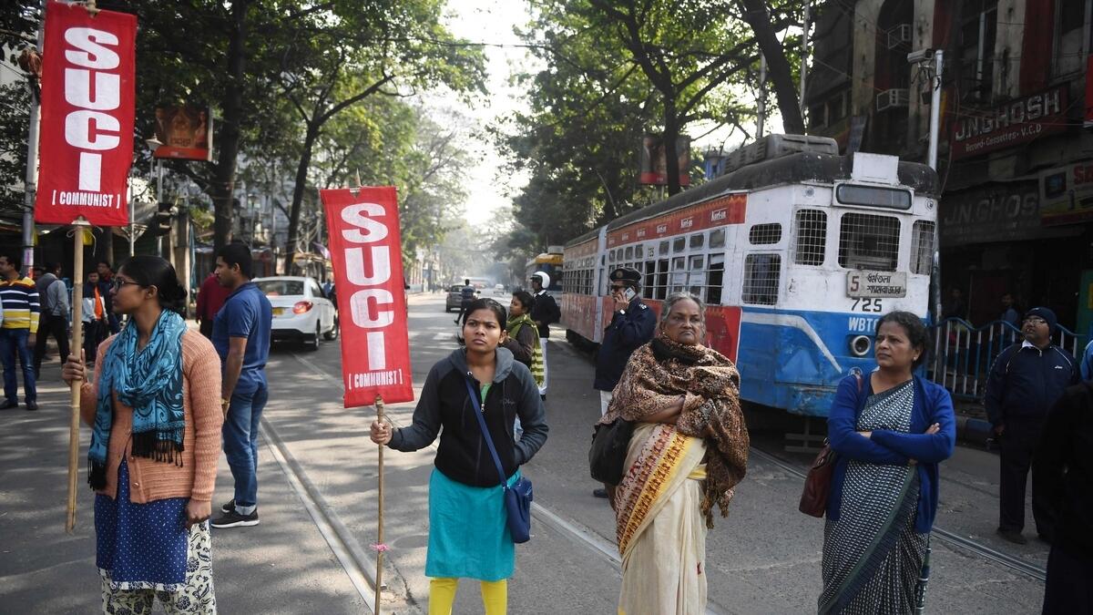 In the eastern state of West Bengal, workers disrupted train services in Kolkata and other towns while shops and banks were shut at various places.
