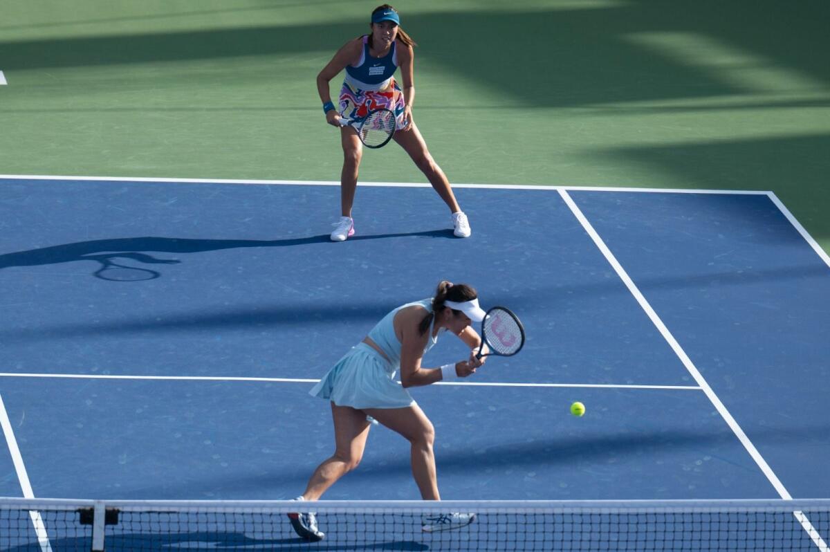 Latisha and Hao Ching Chan in action during their doubles semifinal match. — Photo by Shihab
