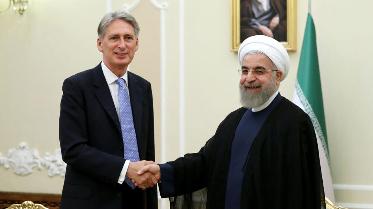 Britain says Iran sanctions could be lifted next spring