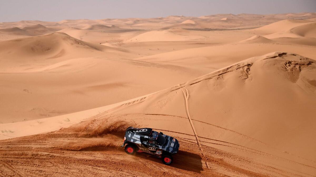 Carlos Sainz and co-driver Lucas Cruz of Spain compete during Stage 3 of the Dakar Rally. (AFP)