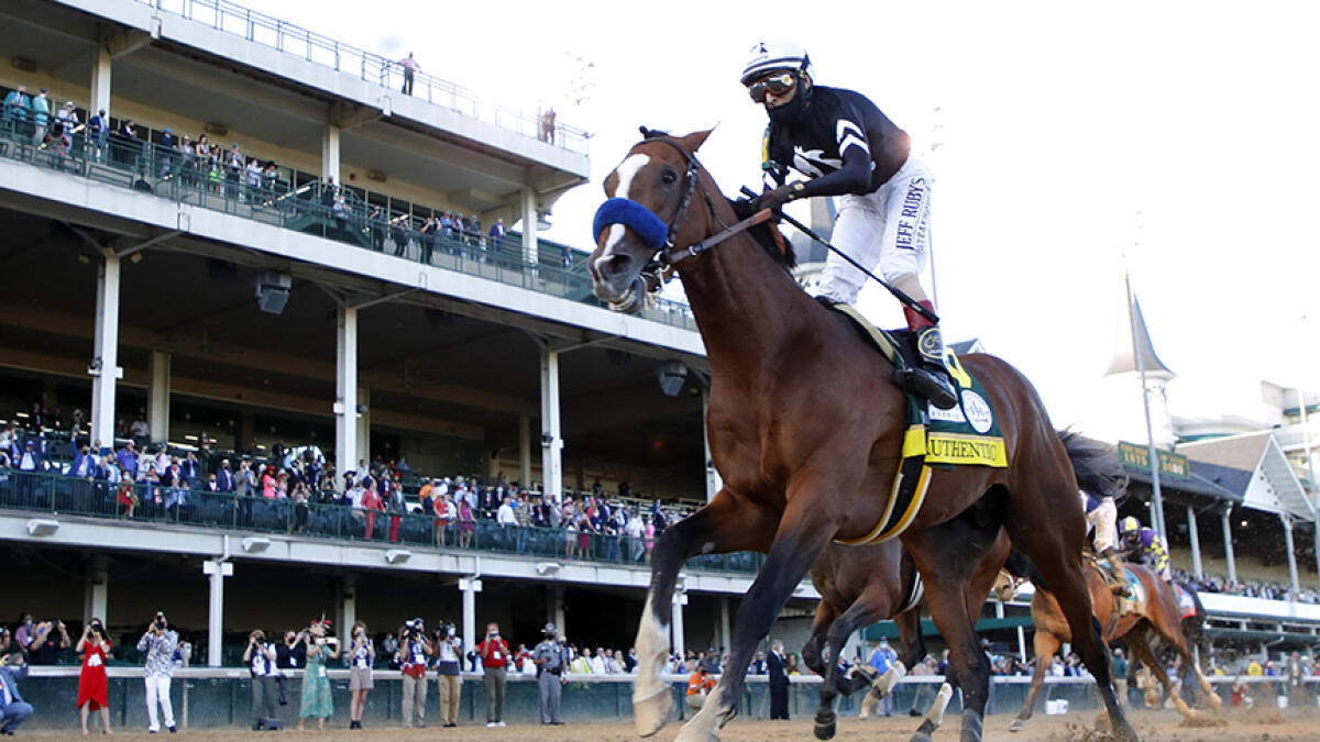 Authentic ridden by jockey John Velazquez crosses the finish line to win the 146th running of the Kentucky Derby at Churchill Downs on Saturday in Louisville, Kentucky. -- AFP
