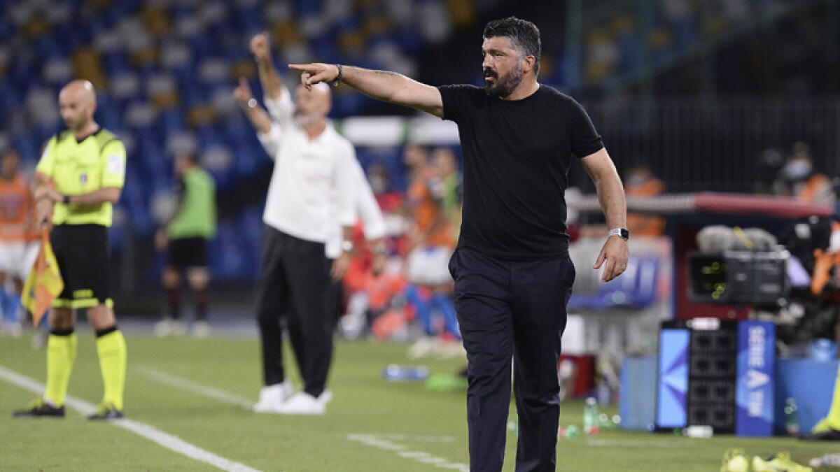 Napoli coach Gennaro Gattuso shouts instructions to his team during a Serie A match against AC Milan on Sunday. - AP