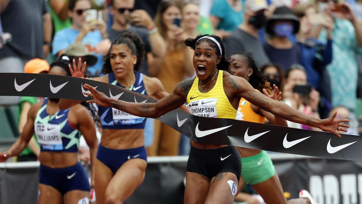 Elaine Thompson-Herah of Jamaica celebrates winning the 100m race during the Wanda Diamond League Prefontaine Classic at Hayward Field in Eugene, Oregon. — AFP