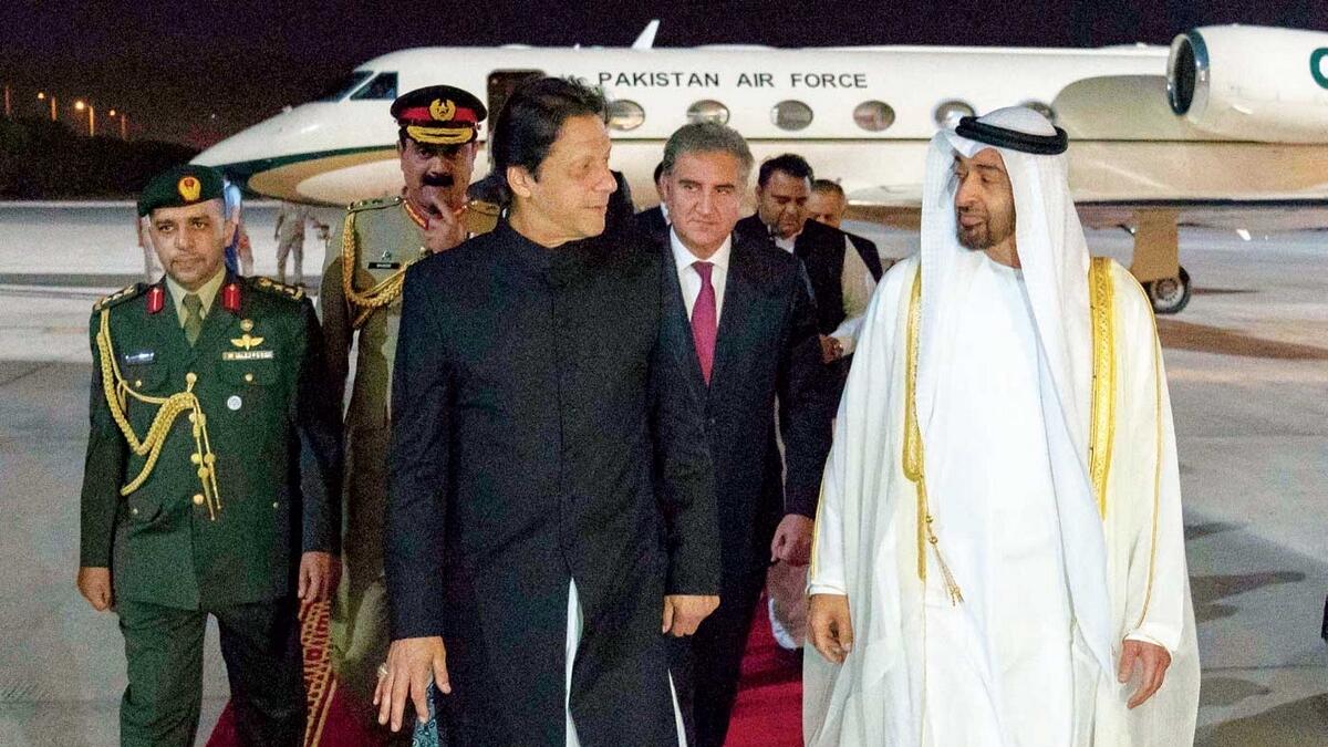 Sheikh Mohamed receives Imran Khan at Abu Dhabi airport. — Wam