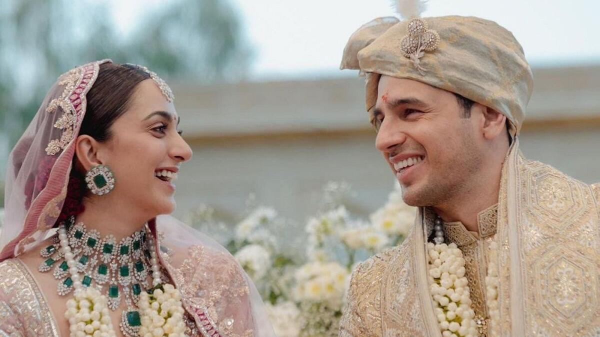 **EDS: TWITTER IMAGE VIA @SidMalhotra** Jaisalmer: Bollywood actors Sidharth Malhotra and Kiara Advani during their wedding ceremony, at Suryagarh Palace in Jaisalmer, Tuesday, Feb. 7, 2023. (PTI Photo)(PTI02_08_2023_000001B)