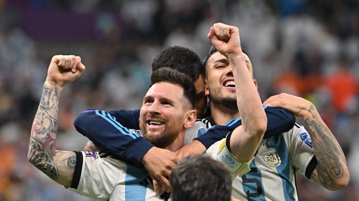 Argentina's forward Lionel Messi celebrates after qualifying to the next round after defeating the Netherlands in the penalty shoot-out of the Qatar 2022 World Cup quarter-final football. — AFP