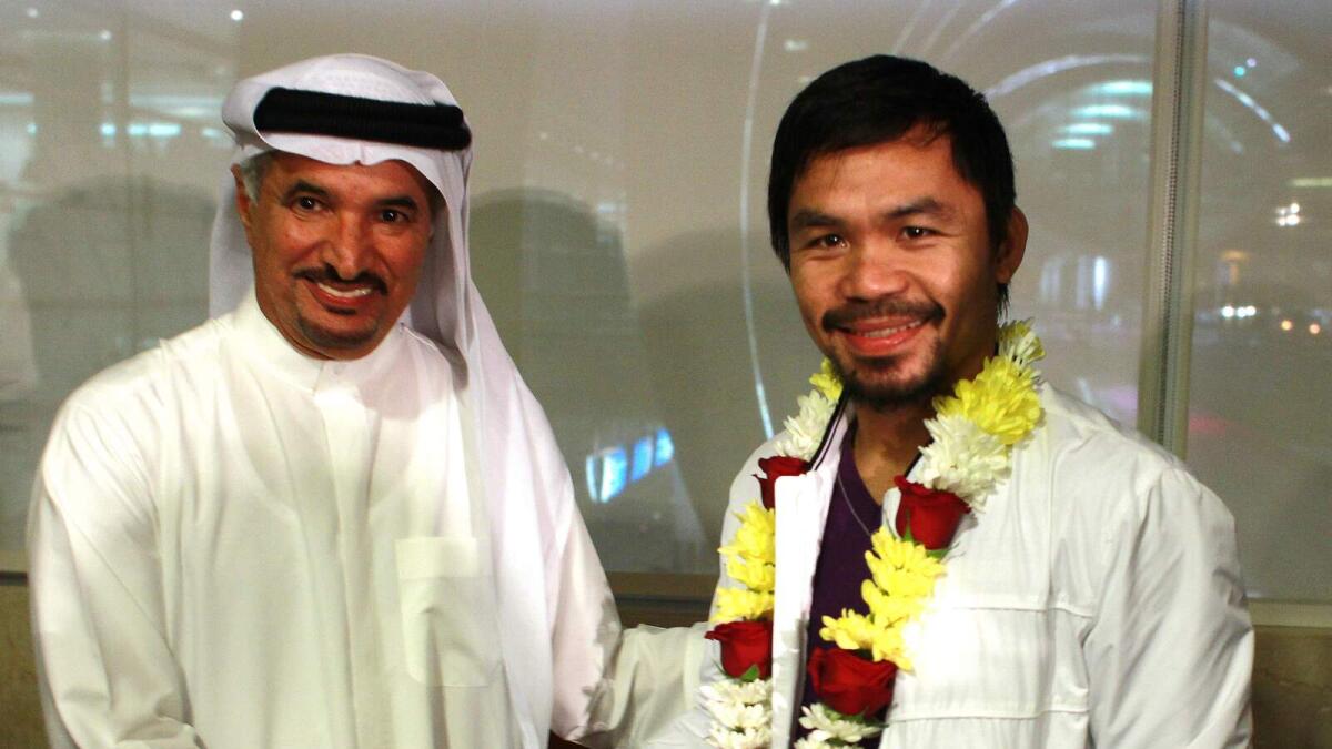 Pacquiao arrives in Dubai, says he may opt for basketball