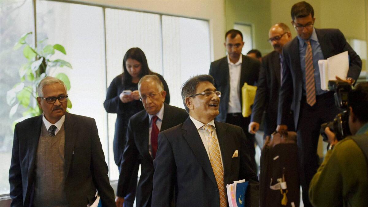 Chairman of the Supreme Court Committee on Reforms in Cricket Justice (retd.) R M Lodha with members Justice Ashok Bhan and Justice R V Raveendran (L) arrive to address a press conference after tabling their report in New Delhi on Monday. PTI