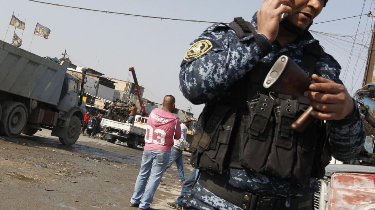 Suicide truck bomber kills at least 15 in Iraq