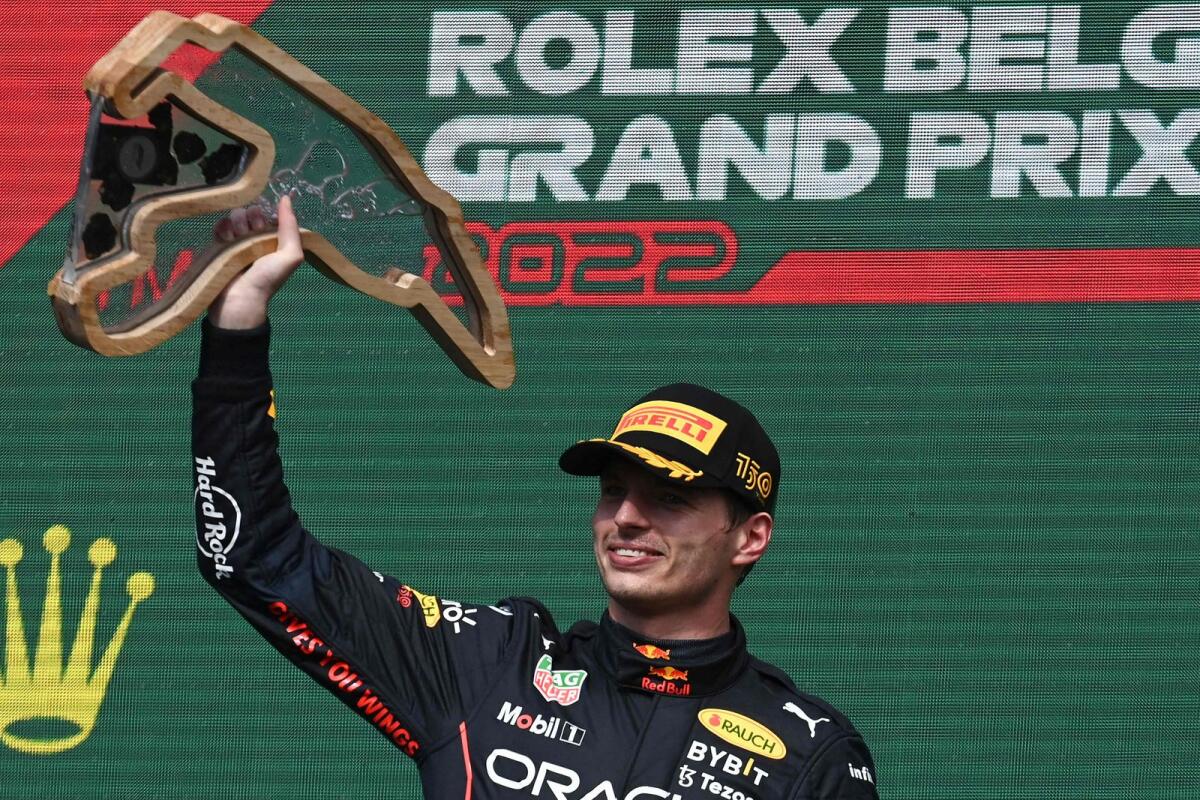 Red Bull Racing's Dutch driver Max Verstappen celebrates his victory during the podium ceremony. (AFP)