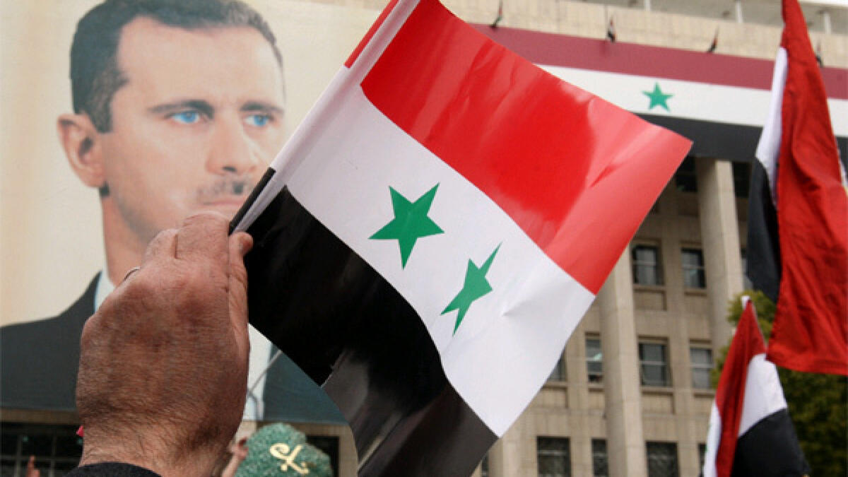 Assad calls for Syria vote, but steps up assault