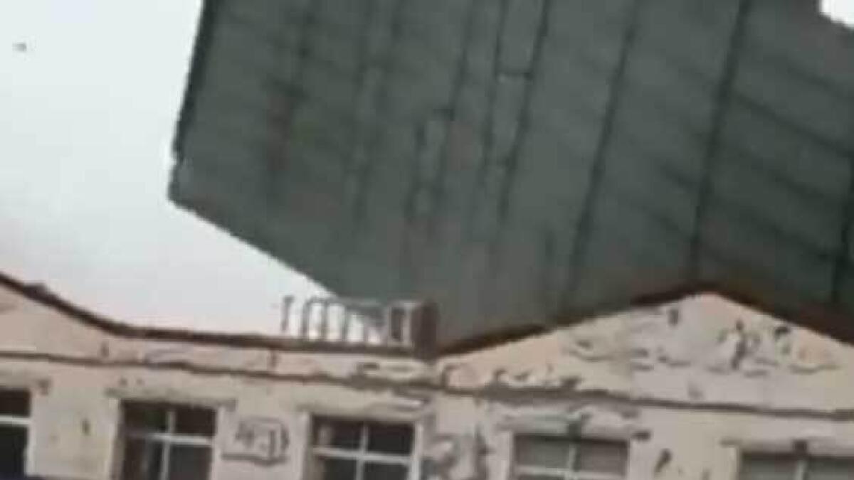 Video: Wind rips off buildings roof in China