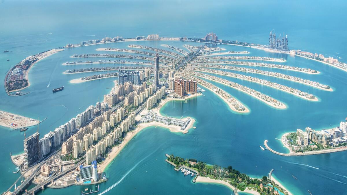 Aerial view of Dubai Palm Jumeirah Island. The Dubai property market has shown resilience and adaptability despite challenging global economic conditions.