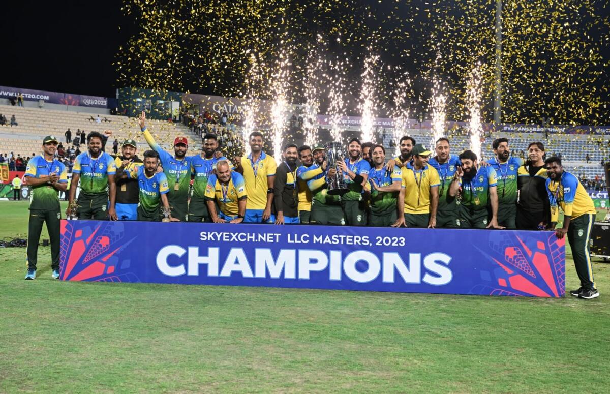 Asia Lions players celebrate with the trophy. — Supplied photo