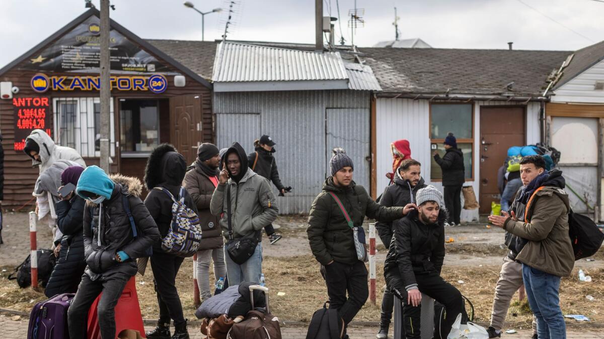 Refugees from many different countries - from Africa, Middle East and India - mostly students of Ukrainian universities are seen at the Medyka pedestrian border crossing fleeing the conflict in Ukraine, in eastern Poland on February 27, 2022. Photo: AFP