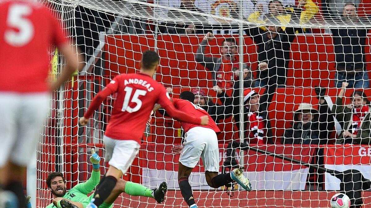 Liverpool strike late, but winning run ends in 1-1 draw at Man Utd
