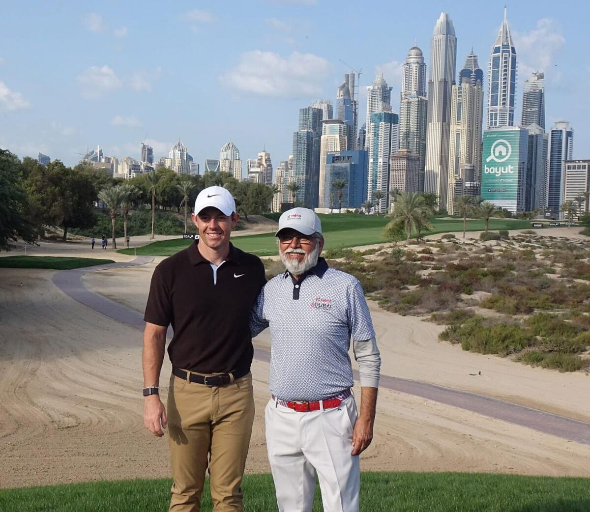 Dr. Pawan Munjal with Rory McIlroy. — Supplied photo