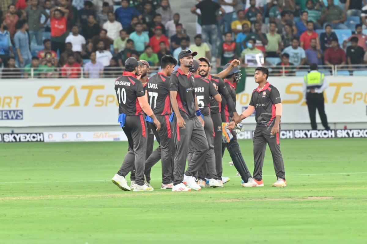 The UAE players celebrate a wicket during the second T20 against Bangladesh at the Dubai International Cricket Stadium on Tuesday. (Photo by M. Sajjad)