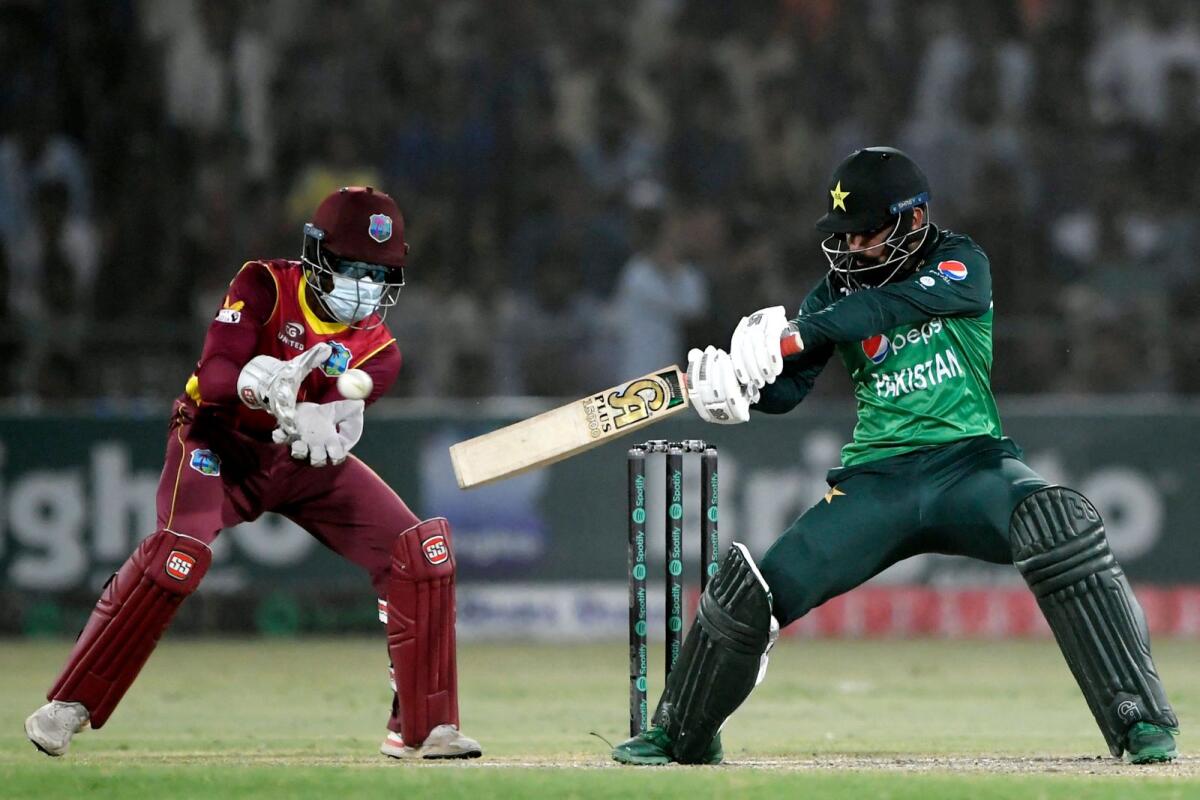 Shadab Khan plays a shot during the third ODI. (AFP)
