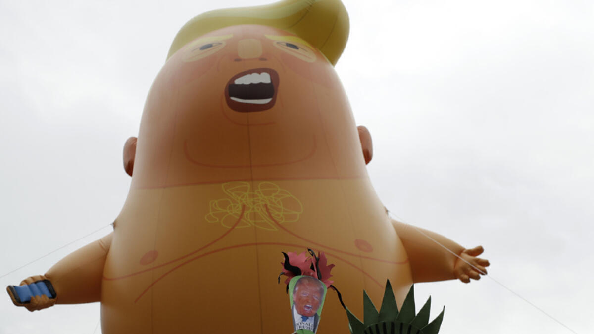 Giant Trump Baby blimp glides over London in protest