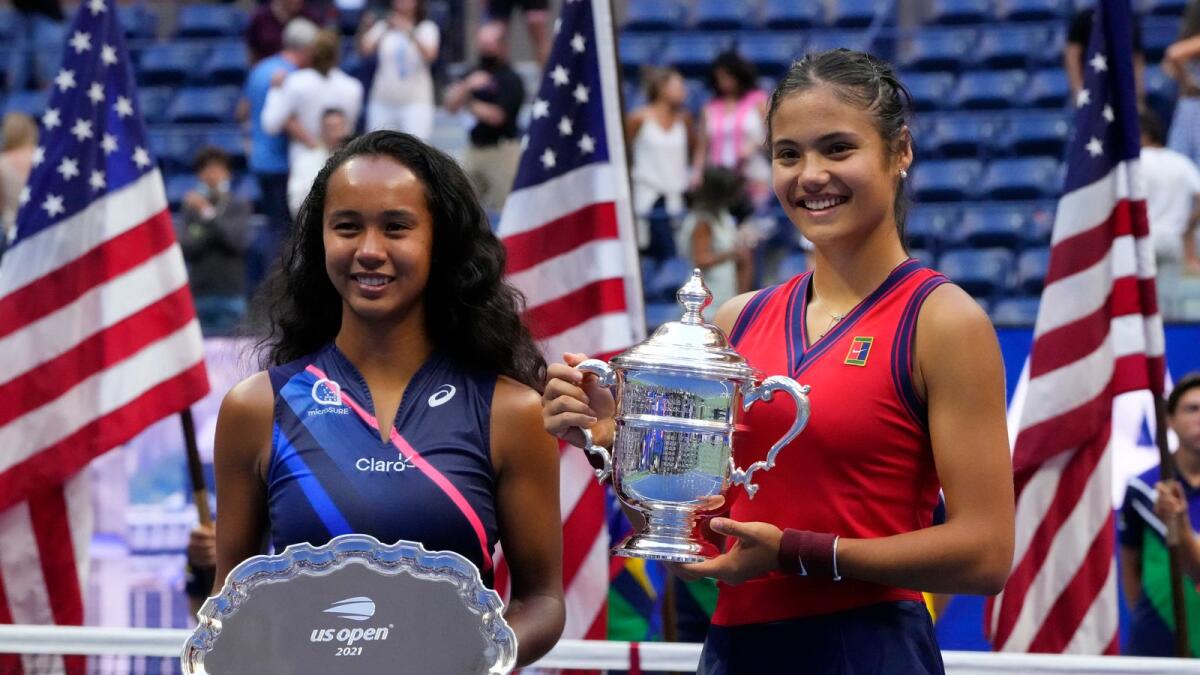 Emma Raducanu (right) beat Leylah Fernandez in a historic all-teen US Open final. (AFP)