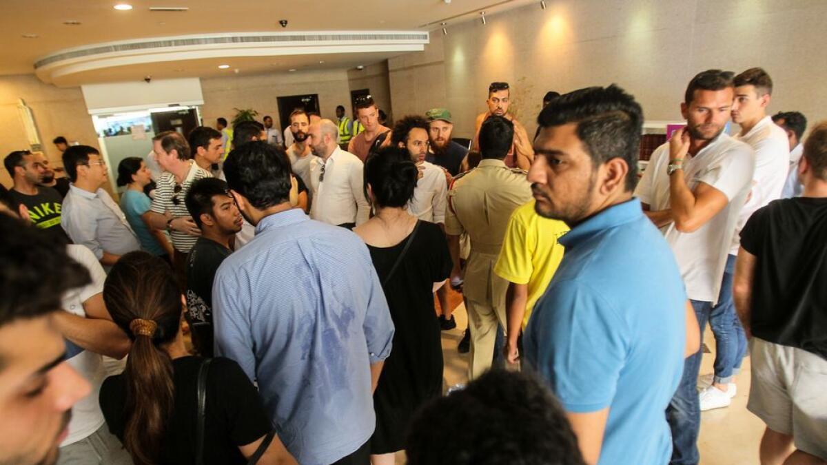 Residents of Sulafa tower waiting outisde and in the lobby to get access to their homes after the building caught fire on Wednesday at Dubai Marina. 