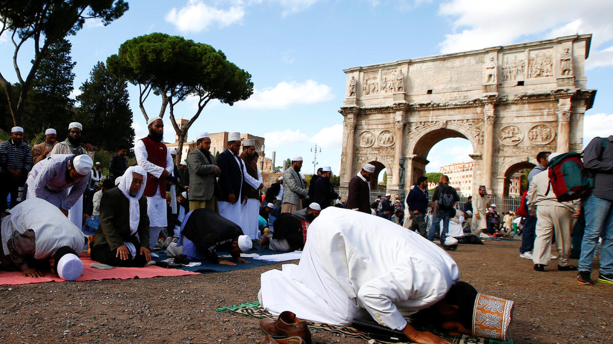 Muslims pray at Colosseum, protest against Rome mosque closures
