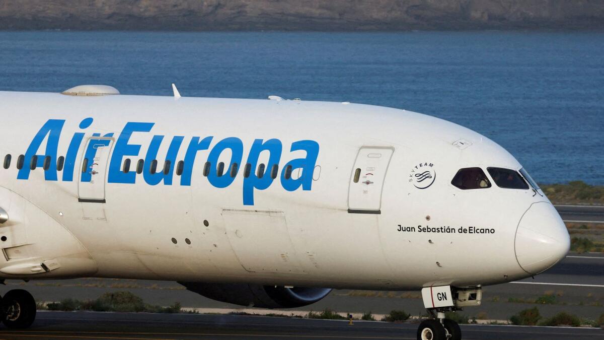 A Boeing 787-9 Dreamliner of Air Europa is seen in the Gran Canaria airport, Spain. On Thursday, IAG announced the acquisition of Air Europa for 500 million euros. - Reuters
