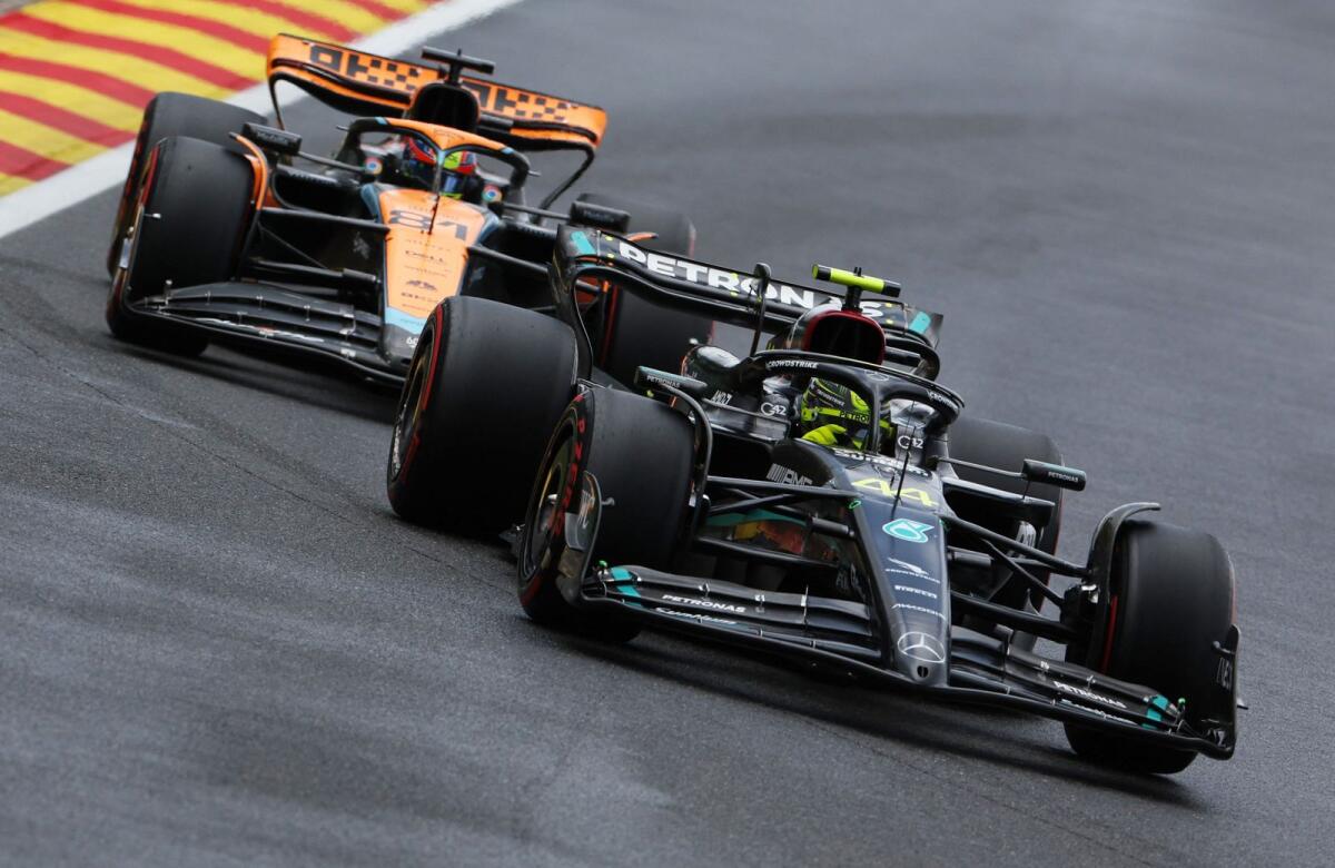 Mercedes' Lewis Hamilton and McLaren's Oscar Piastri in action during the sprint shootout. - Reuters