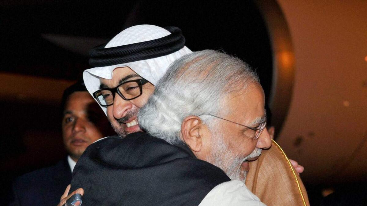 Indian Prime Minister Narendra Modi greets His Highness Shaikh Mohammed bin Zayed Al Nahyan, Crown Prince of Abu Dhabi and Deputy Supreme Commander of the UAE Armed Forces, after the prince arrived at an air force base in New Delhi on February 10, 2016.