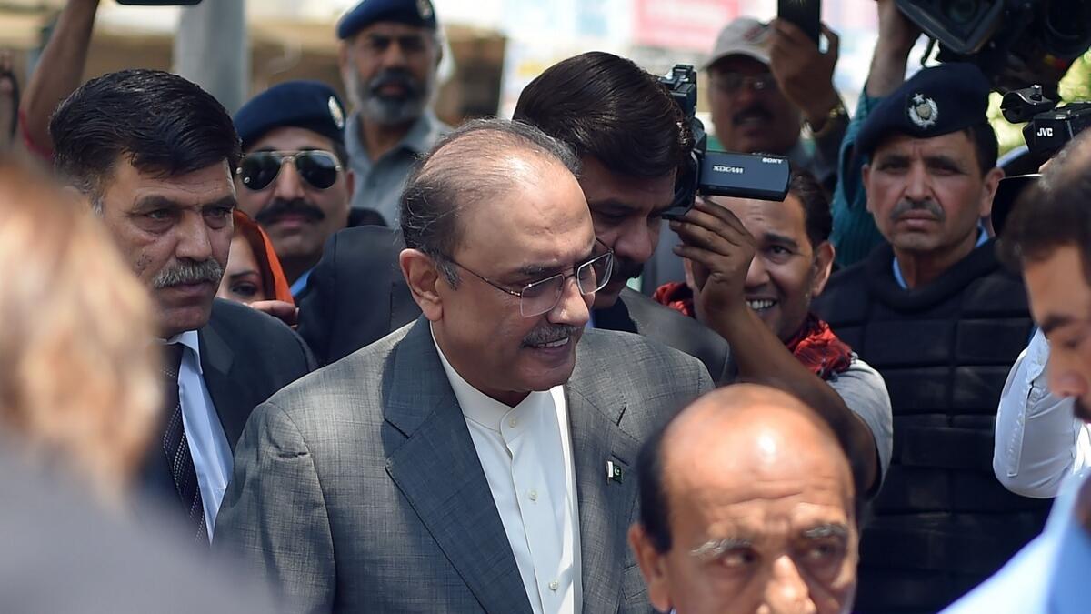 Former Pakistani President and the co-chairperson of Pakistan Peoples Party (PPP) Asif Ali Zardari (2L) arrives for his bail appeal at Islamabad High Court on June 10, 2019.-AFP 